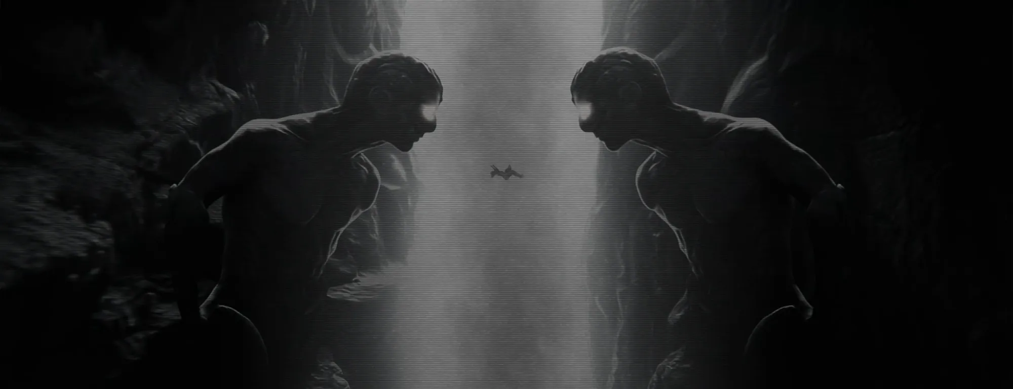 Screen content: two stone sphinxes either side of a chasm